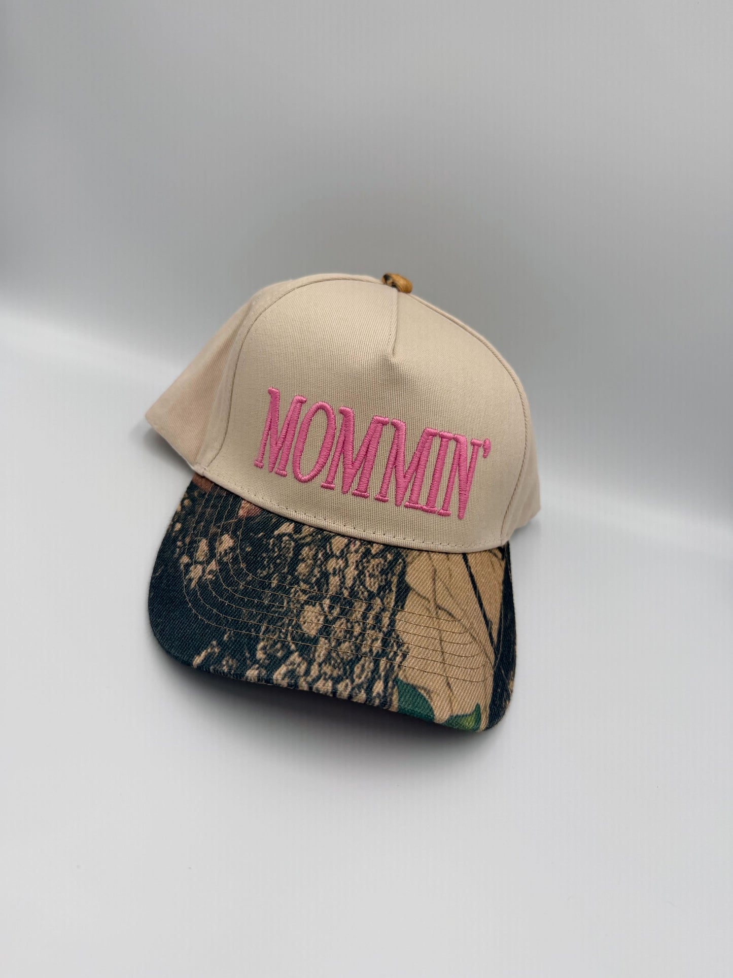 Mommin’ Hat – Pink PUFF Embroidered Camo Brim Cap