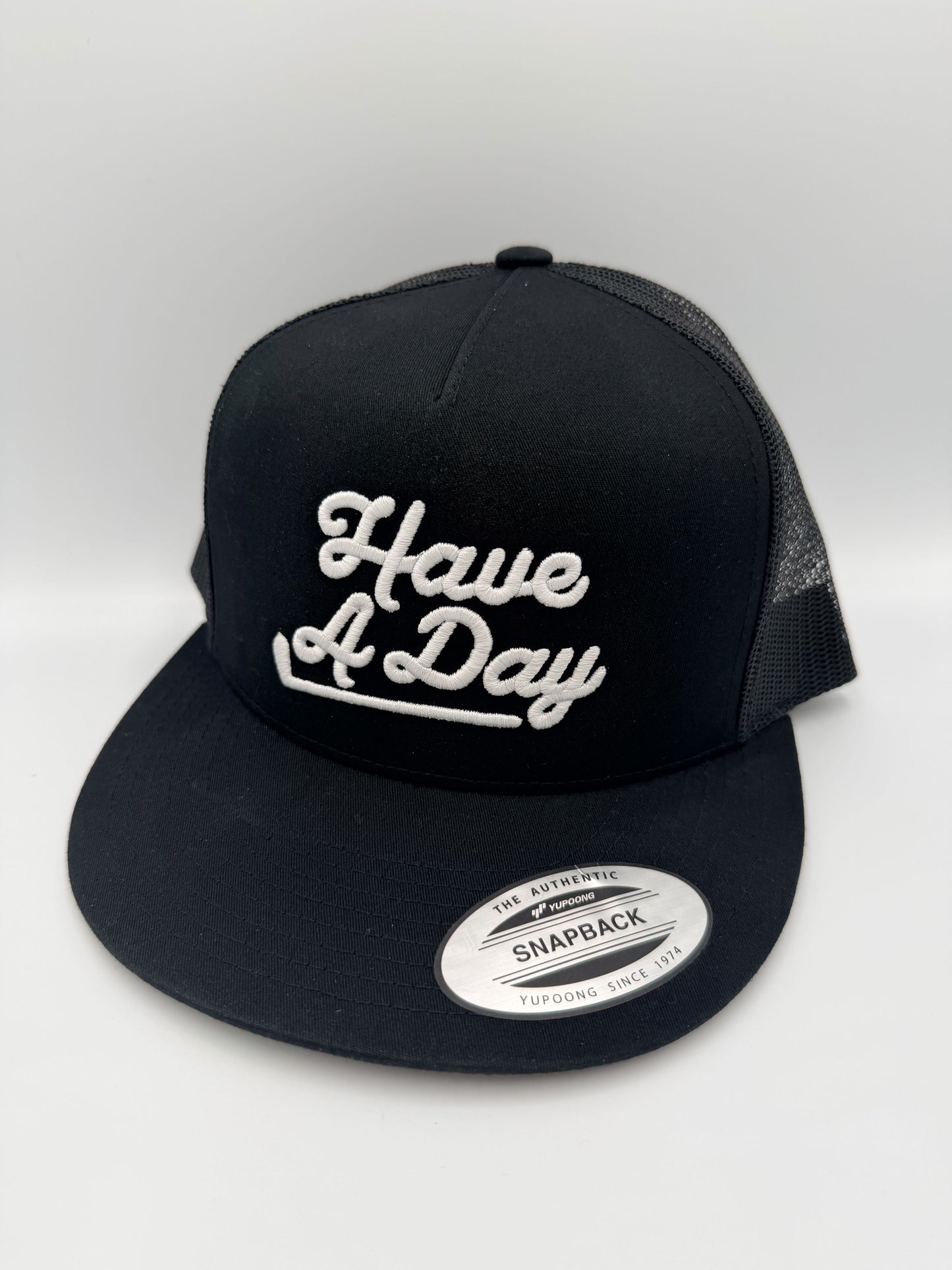 Have A Day Golf Puff Snapback – Black & White Trucker Hat